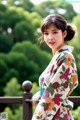 A woman in a floral kimono posing for a picture.